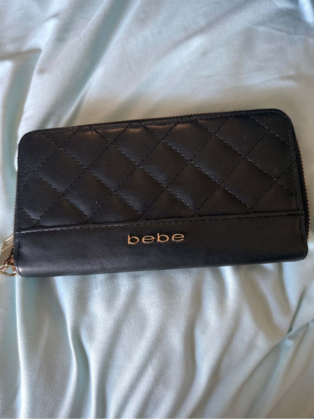 bebe Black Quilted Zip-Around wallet  with Gold Logo